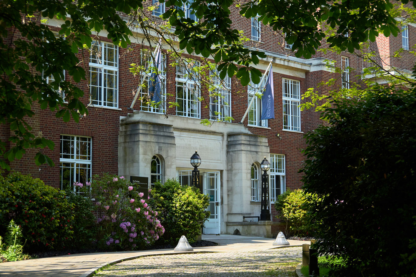 Regent's University London campus entrance in full bloom during April