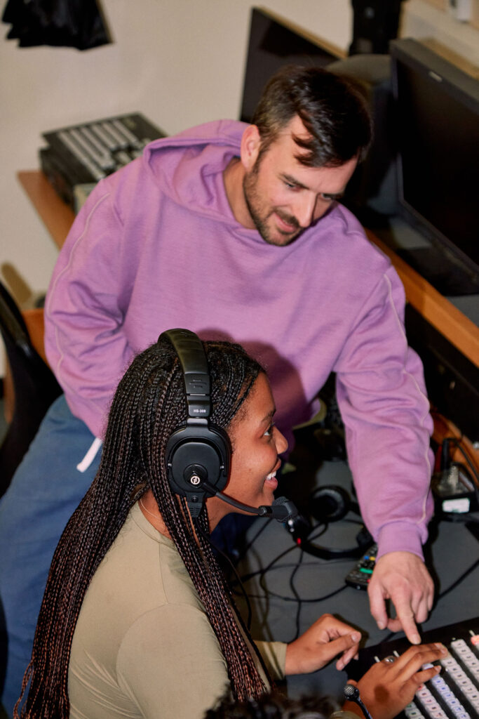 Film course at Regents University London: Instructor teaching students green screen techniques