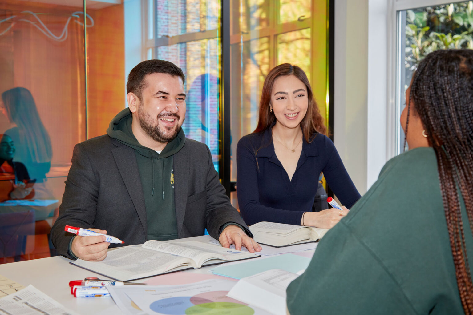 Showcasing their pride: Regents University London students united in their vest jackets